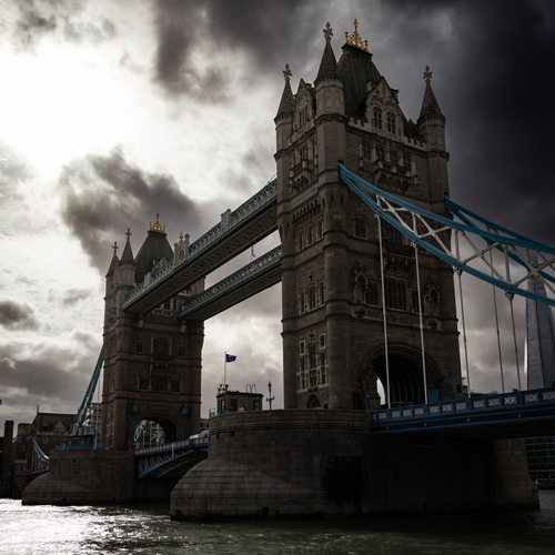 Tower Bridge, London, under a stormy sky