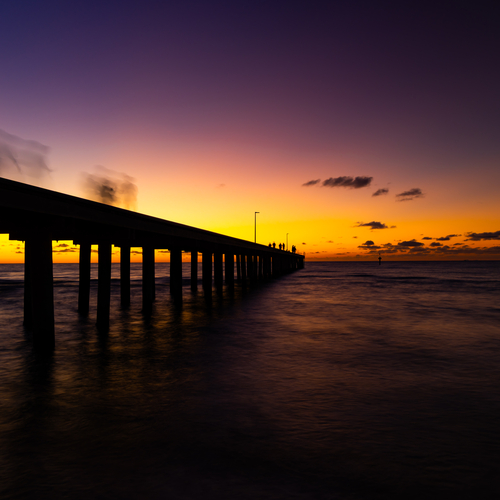 Pier silhouette at sunset