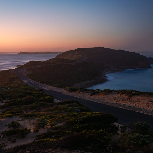 Coastal road along the cliffs at dusk